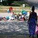 A family on Aug. 25, 2014, visits the memorial set up for Michael Brown on the spot he was shot in Ferguson, Mo.
Joe Raedle/Getty Images
